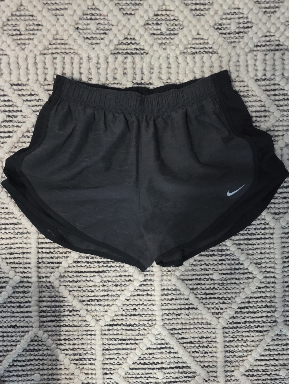 Nike Women’s Black Athletic Shorts with Silver Swoosh